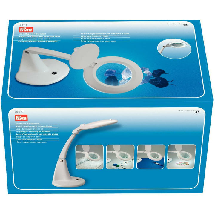 Illuminated magnifying glass with white stand